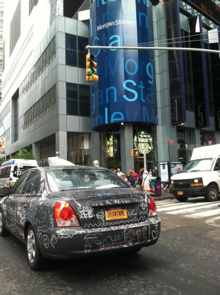Illustration for article titled Artist Turns His Hyundai Into Art-on-Wheels With Chalkboard Paint